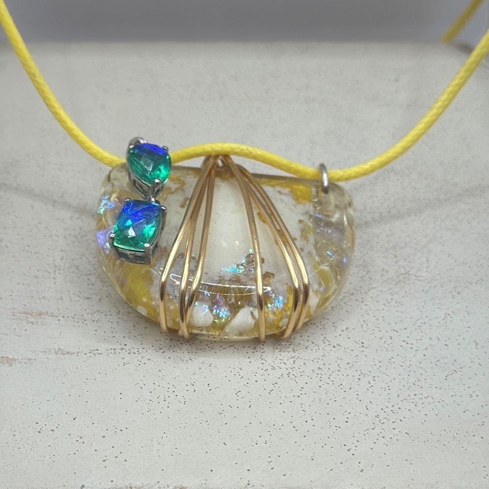 Copper wire wrapped Pendant Necklace on yelllow cord .